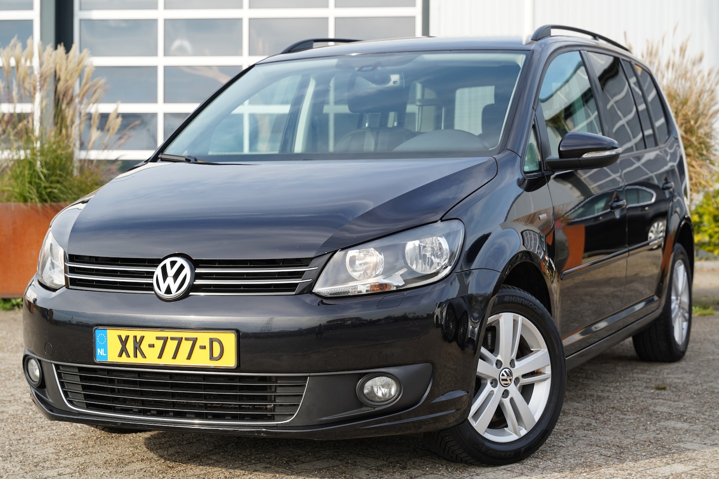 Volkswagen Touran - 1.4 TSI Highline 140pk | Audio-navigatie full map | Bluetooth | Cruise control | Isofix be - AutoWereld.nl