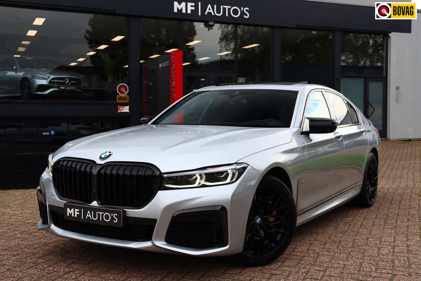 BMW 7-serie - 740i High Executive M-Sport|Pano|360|Keyless|HUD|Luchtvering|20" - AutoWereld.nl