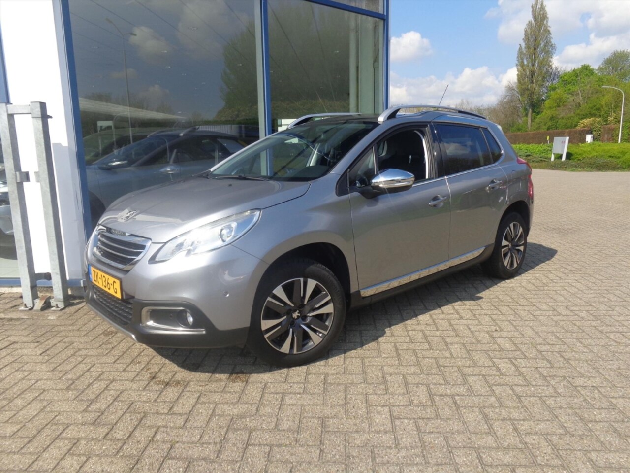 Peugeot 2008 - 1.2 e-VTi 2-Tronic 82pk Allure climate controle navi - AutoWereld.nl
