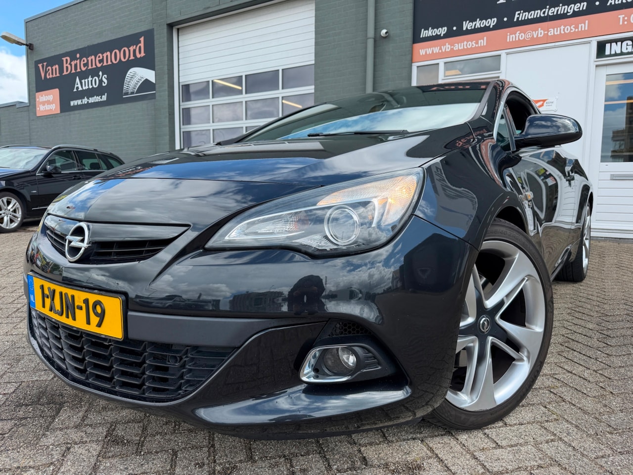 Opel Astra GTC - 1.6 Turbo Sport met leer en parkeersensoren en navigatie en bluetooth en cruise controle e - AutoWereld.nl