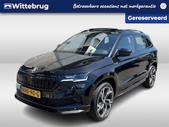 Skoda Karoq - 1.5 TSI ACT Sportline / AUTOMAAT/ PANO/ TREKHAAK/ DCC/ STUUR+STOELVERWARM./ ACC/ PARK.SENS