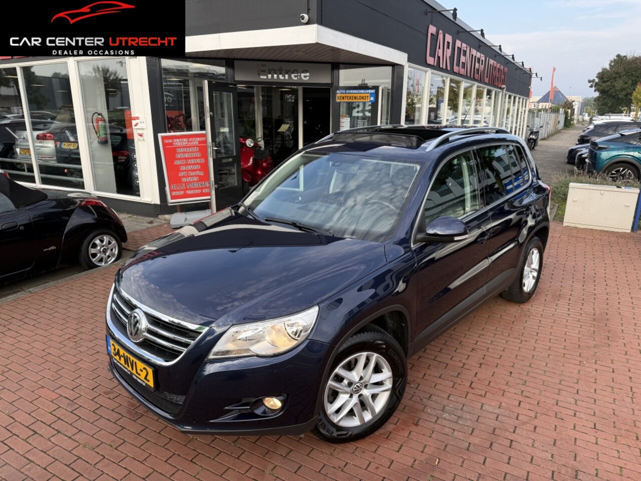 Volkswagen Tiguan - 1.4 TSI Sport&Style 6versn airco navi nette mpv - AutoWereld.nl
