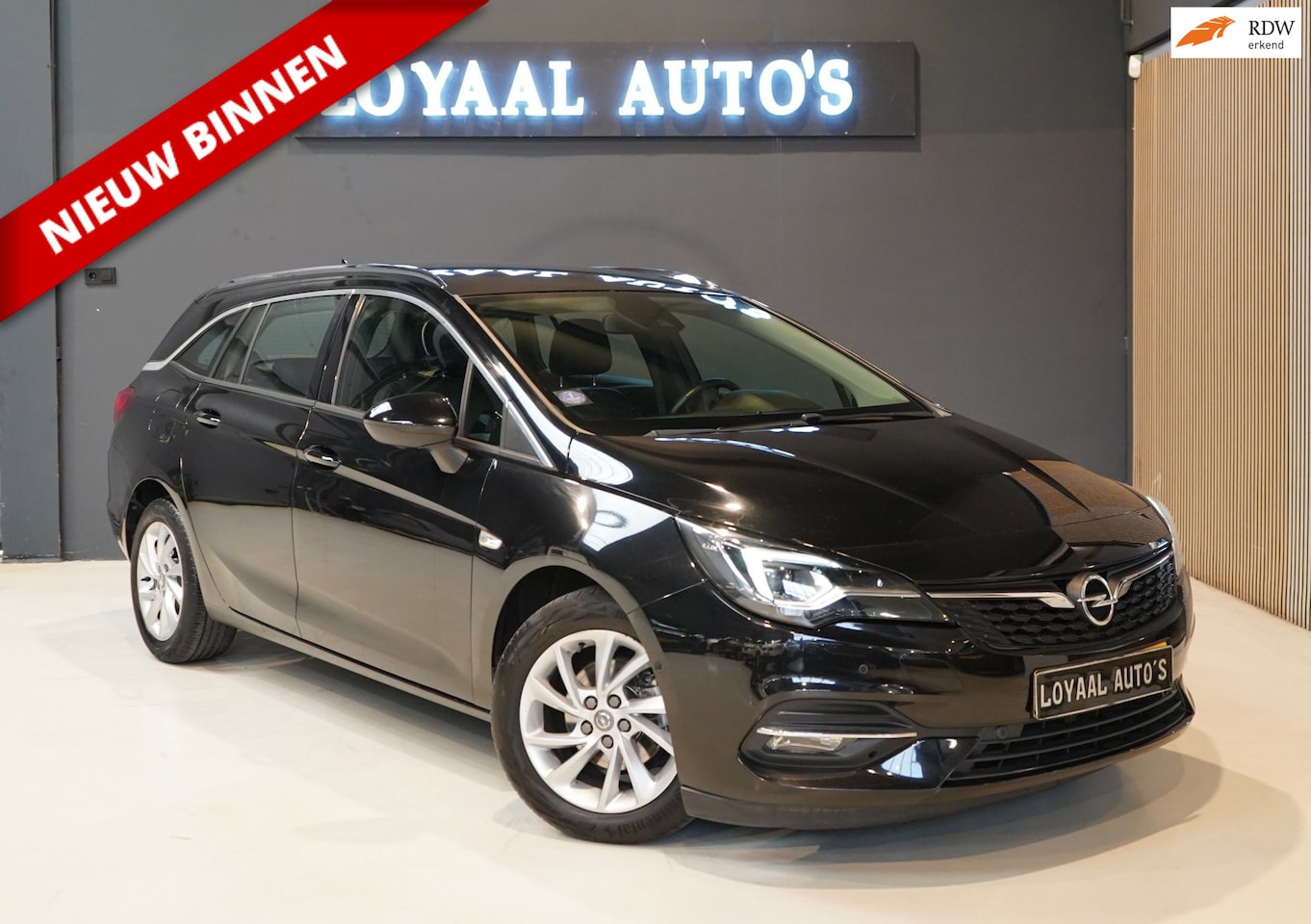 Opel Astra Sports Tourer - 1.2 Elegance | ACHTERUITRIJC. | STOELVER. | STUURVER. | CRUISE | PDC | NAVI | AIRCO | APK - AutoWereld.nl