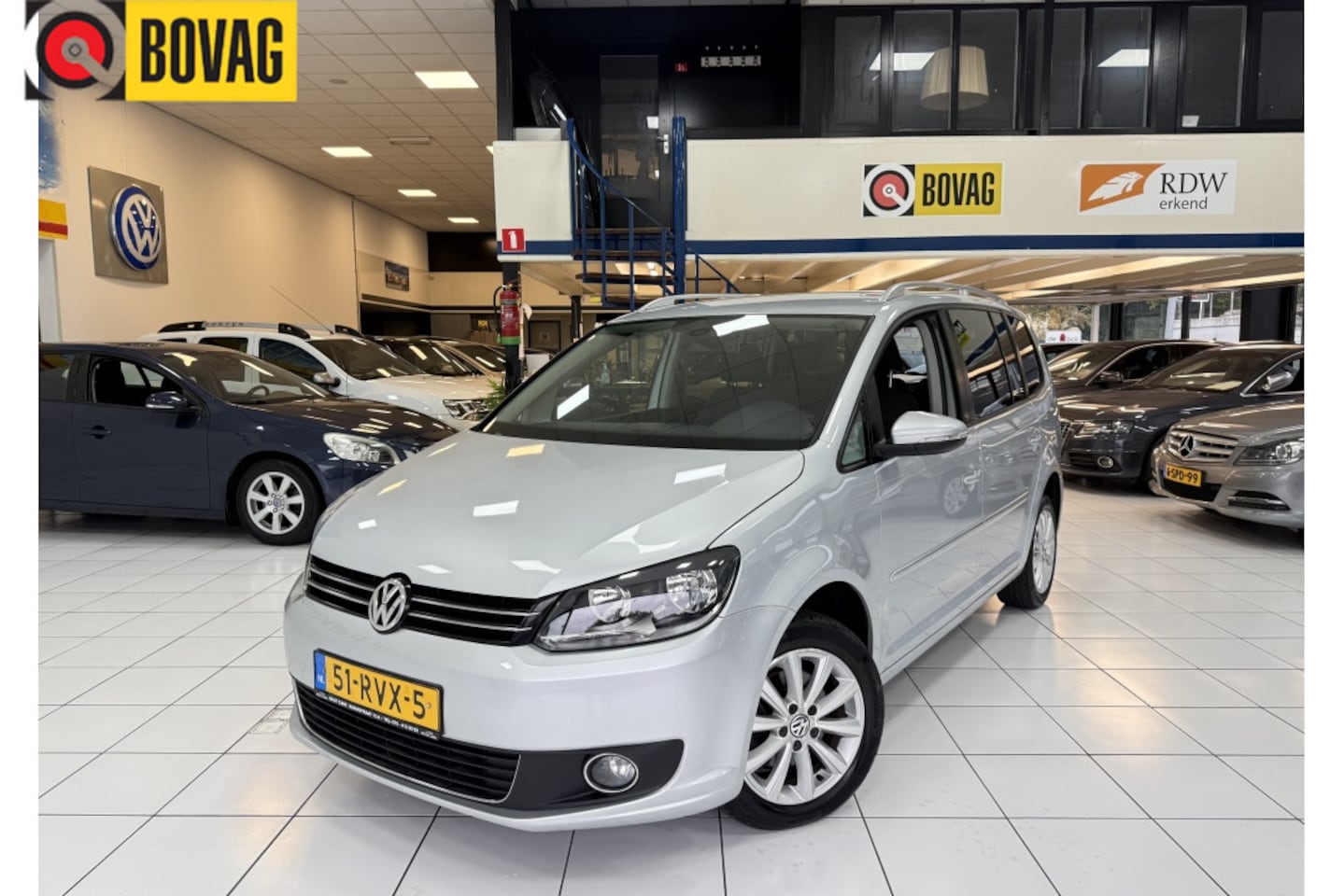 Volkswagen Touran - 1.2 TSI Highl. Bovag Garantie NAP - AutoWereld.nl
