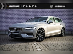 Volvo V60 - 2.0 T6 Plug-in Hybrid AWD Essential Bright | PHEV Long Range | Trekhaak | Lederen Bekledin