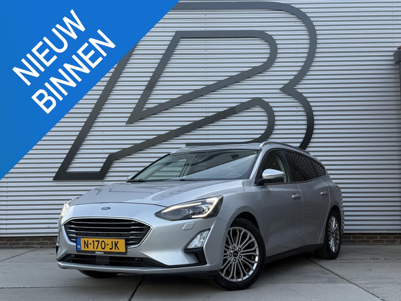Ford Focus Wagon - 1.0 EcoBoost Titanium Business 2e Eigenaar|Navi|Camera|Trekhaak|Clima|Stoelverwarming|PDC - AutoWereld.nl