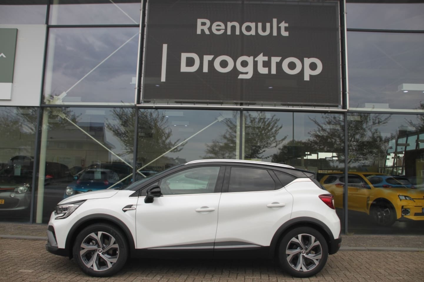 Renault Captur - 145PK-HYBRID-RS LINE-66DKM-NAVI-CLIMA-CRUISE-TREKH!- - AutoWereld.nl