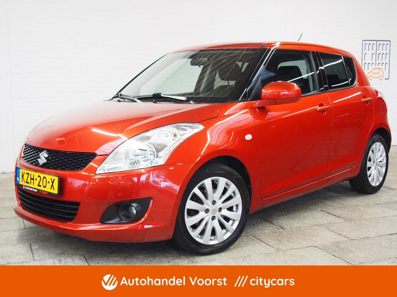 Suzuki Swift - 1.2 Exclusive EASSS Cruise (APK:Nieuw) Incl.Garantie - AutoWereld.nl