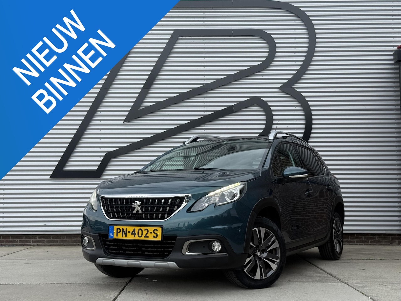 Peugeot 2008 - 1.2 PureTech Allure 2e Eigenaar|Navi|Pano|Clima|Stoelverwarming|Cruise|Carplay|PDC|APK tot - AutoWereld.nl