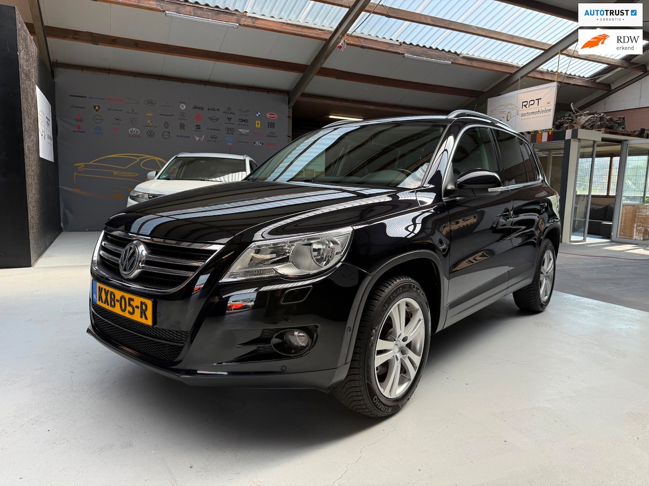 Volkswagen Tiguan - 2.0 TSI Sport&Style 4Motion DSG Automaat - AutoWereld.nl