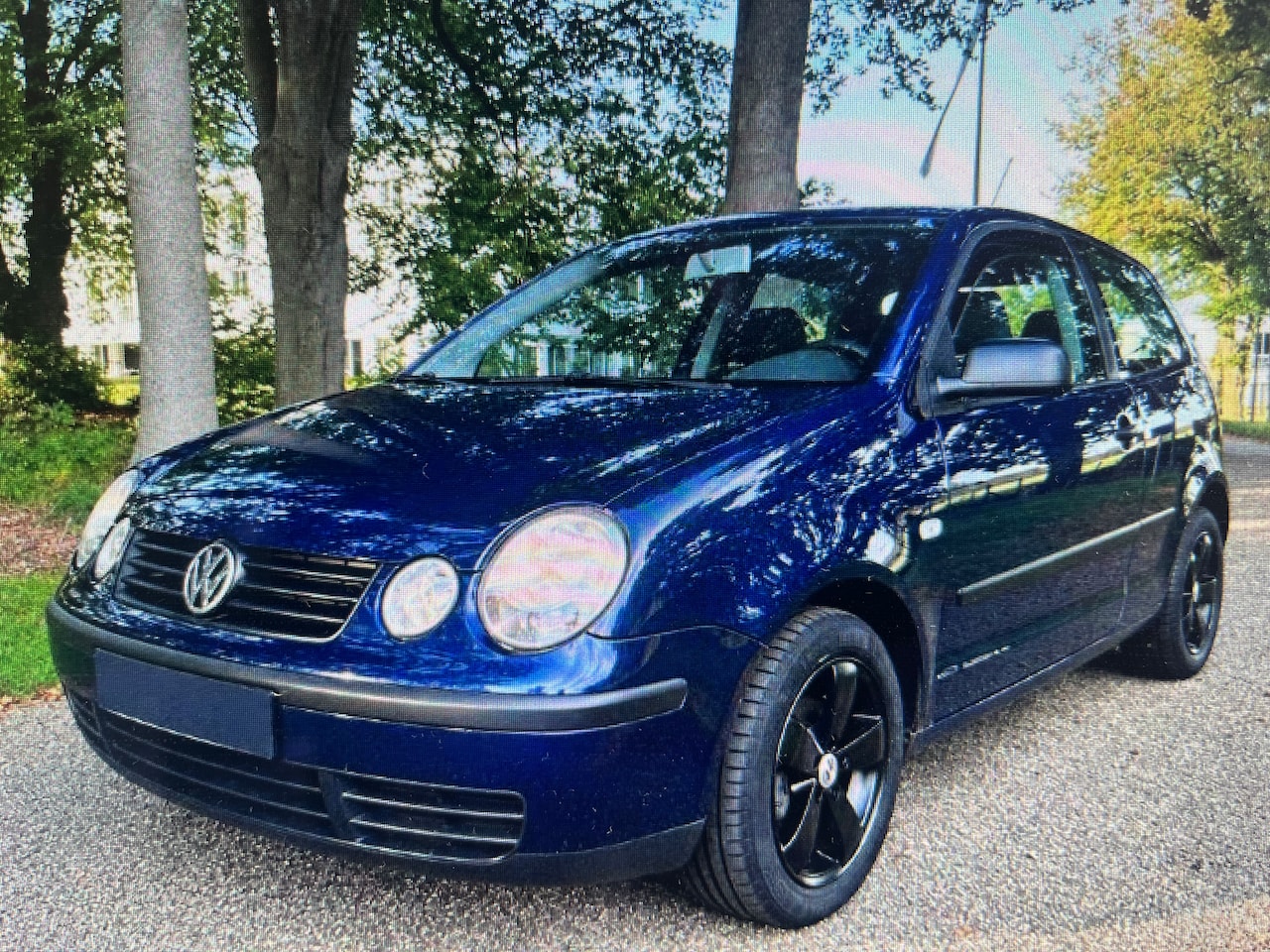 Volkswagen Polo - 1.2-12V Sportline - AutoWereld.nl