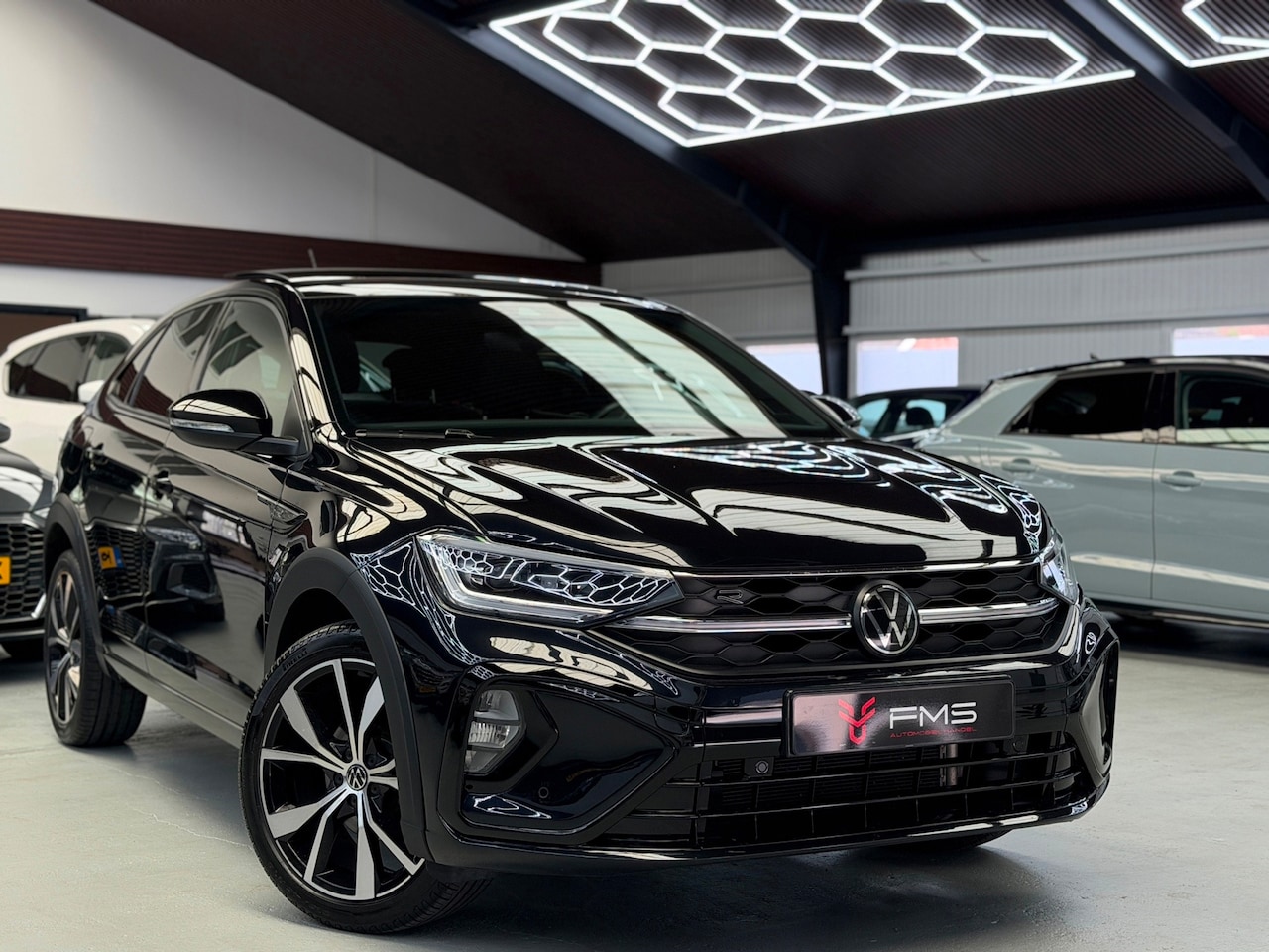 Volkswagen Taigo - 1.0 TSI 2x R-Line Panorama CarPlay Camera - AutoWereld.nl