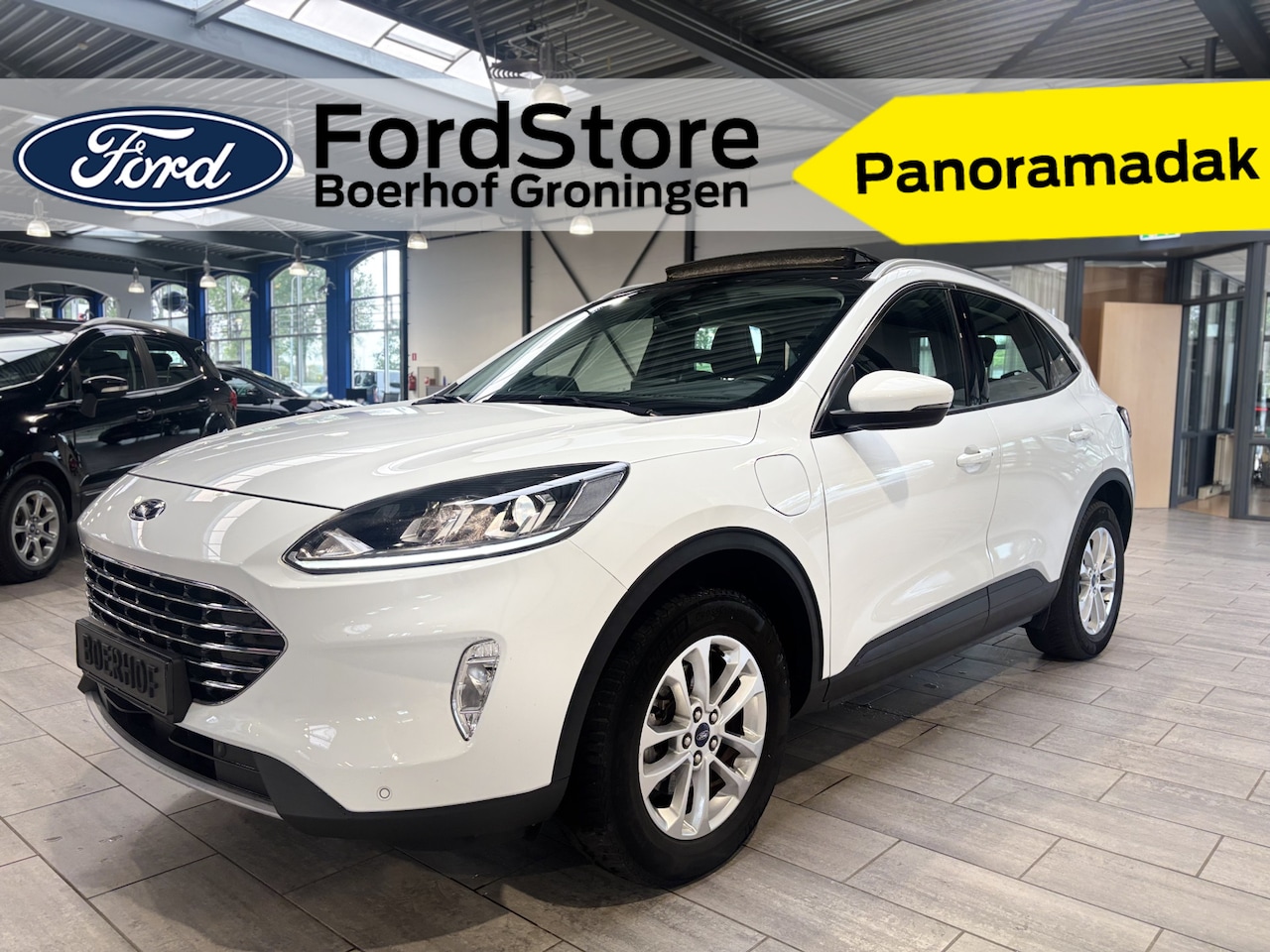 Ford Kuga - 2.5 PHEV 225 pk Titanium | SOH % | Pano | Camera | Elekt. a.klep | Cruise | Winter Pack | - AutoWereld.nl