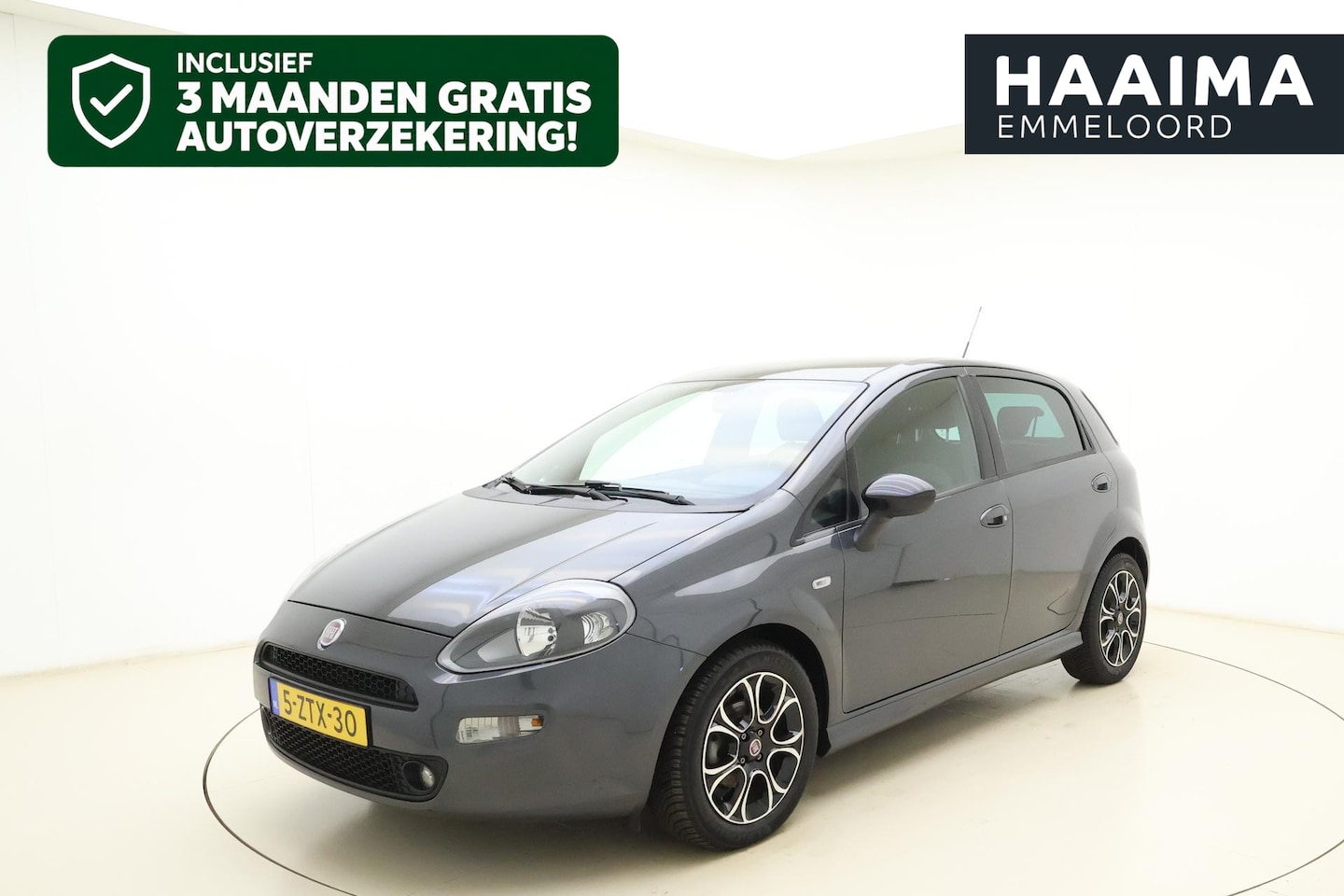 Fiat Punto Evo - 0.9 TwinAir Racing 100pk | 5 Deurs | Airco | Parkeerhulp achter | Lichtmetalen Velgen | Bl - AutoWereld.nl