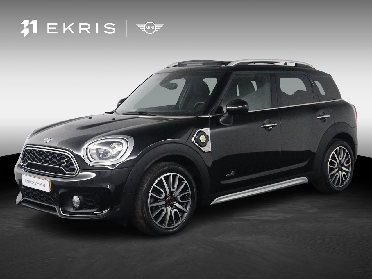 MINI Countryman - 1.5 Cooper S E ALL4 JCW Pakket | Comfort Access | Panoramadak | Harman Kardon | Head-Up Di - AutoWereld.nl
