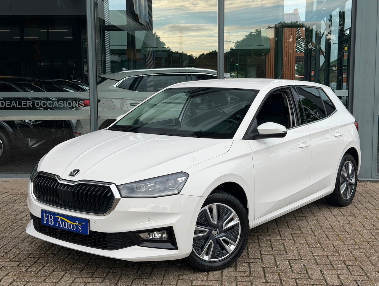 Skoda Fabia - 1.0 TSI Style Airco Lmv Navi Cruise Camera - AutoWereld.nl