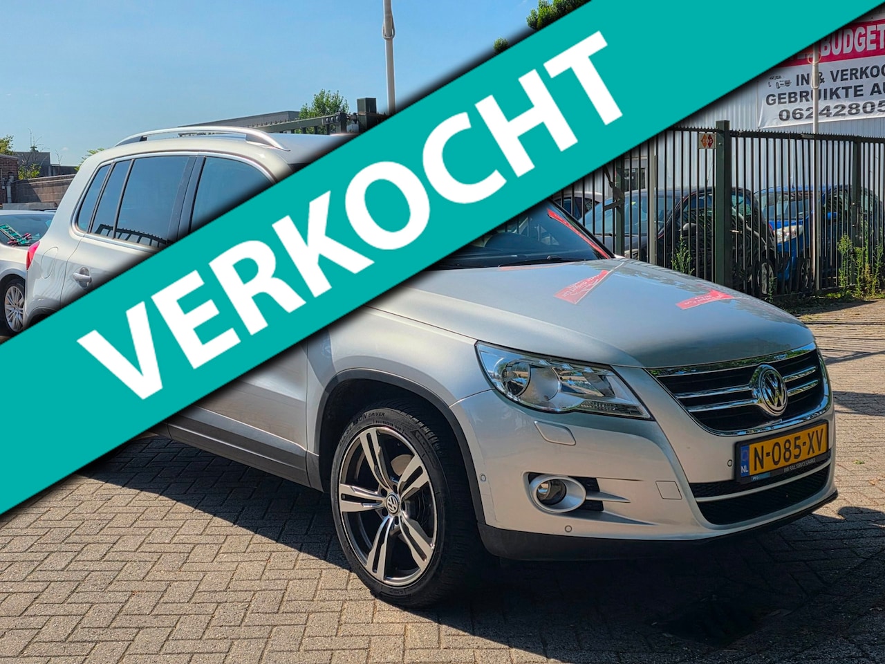 Volkswagen Tiguan - 2.0 TSI Comfort&Design 4Motion Automaat dealer onderhouden achteruit camera airco navigati - AutoWereld.nl