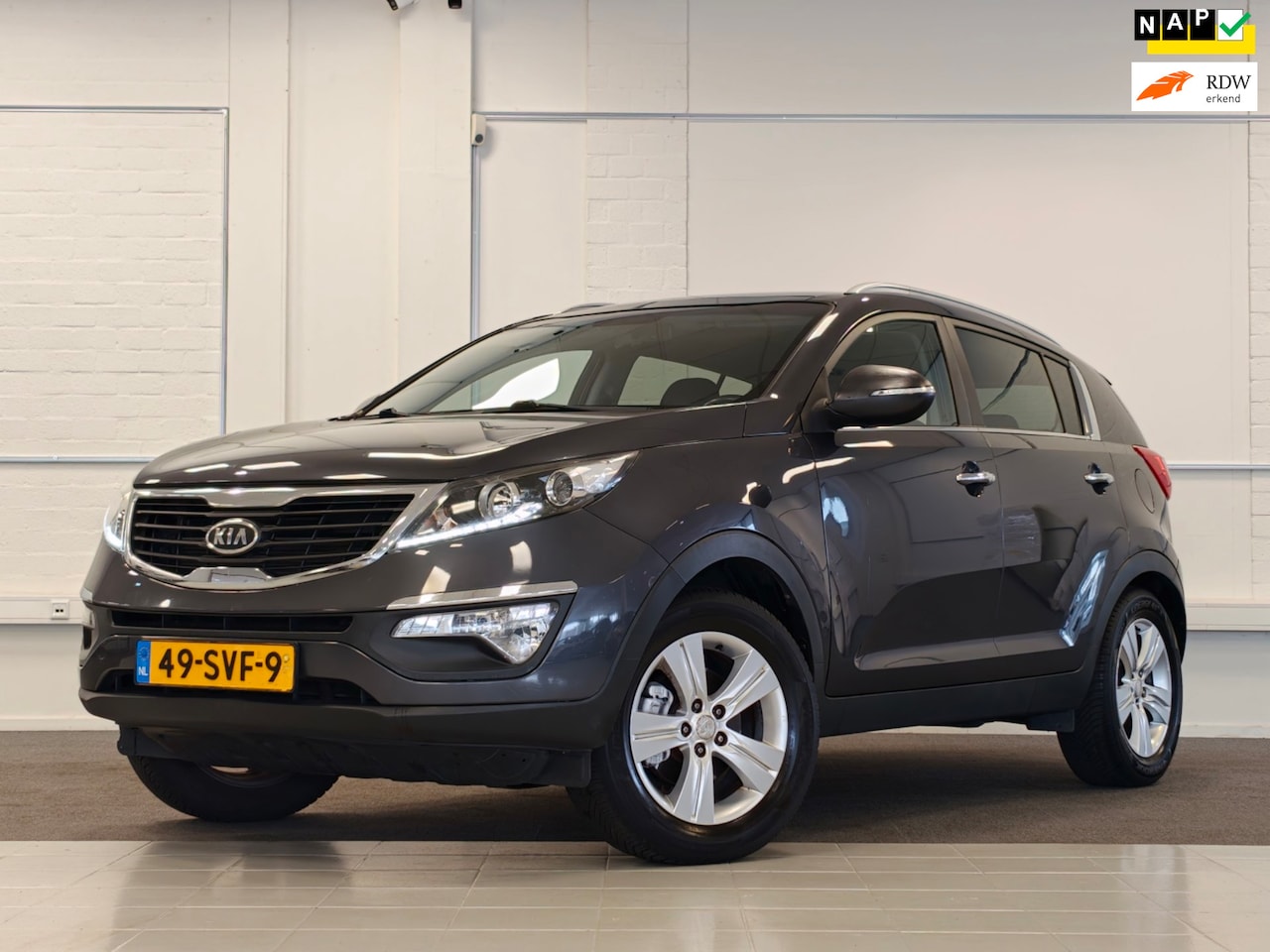 Kia Sportage - 2.0 X-ecutive Plus Pack Automaat Schuif/kanteldak Trekhaak - AutoWereld.nl