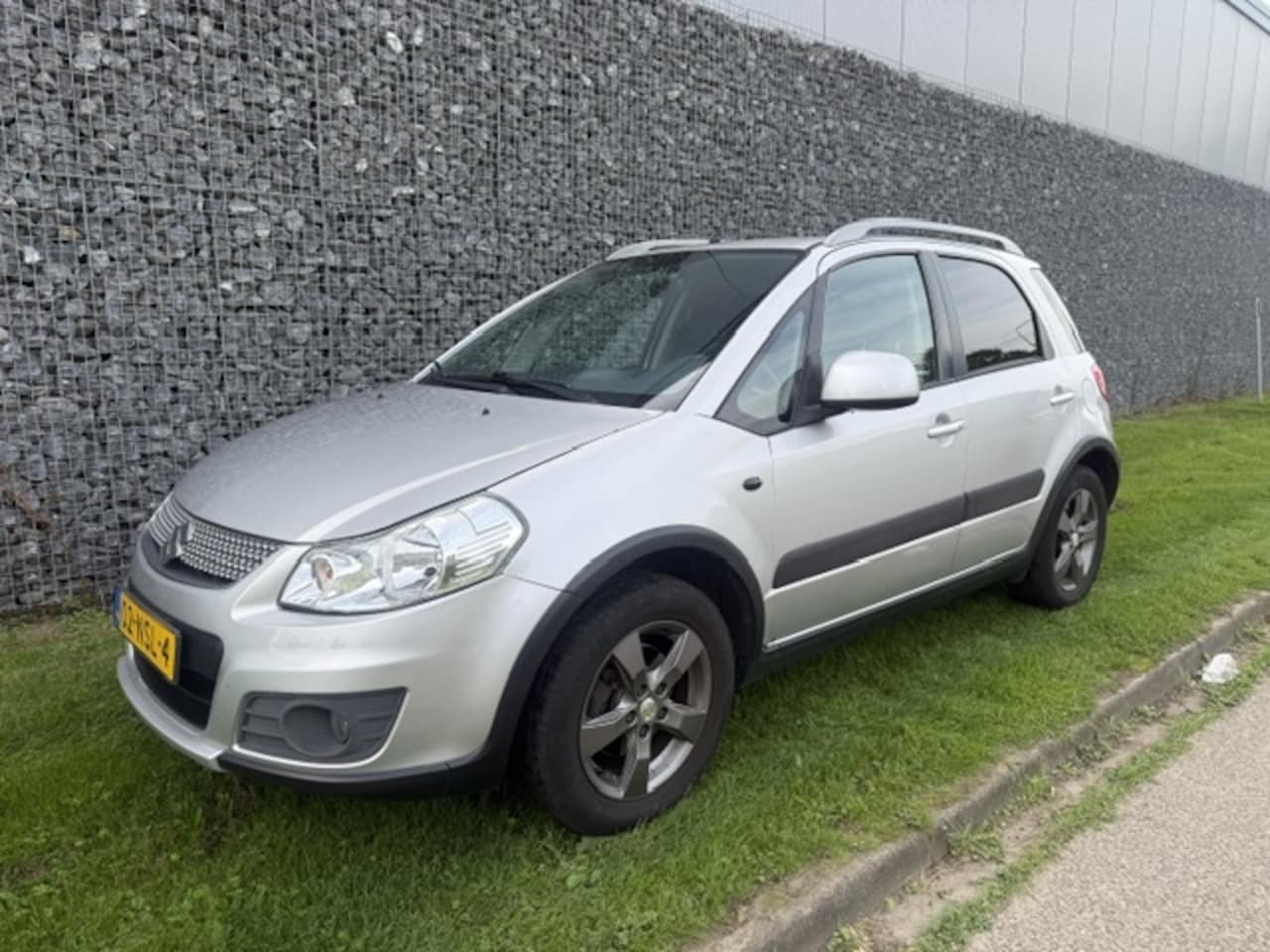 Suzuki SX4 - 1.6 Limited Airco | Hoge instap - AutoWereld.nl