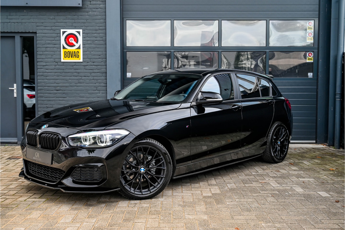 BMW 1-serie - 118i High Executive M140 uitgevoerd - AutoWereld.nl
