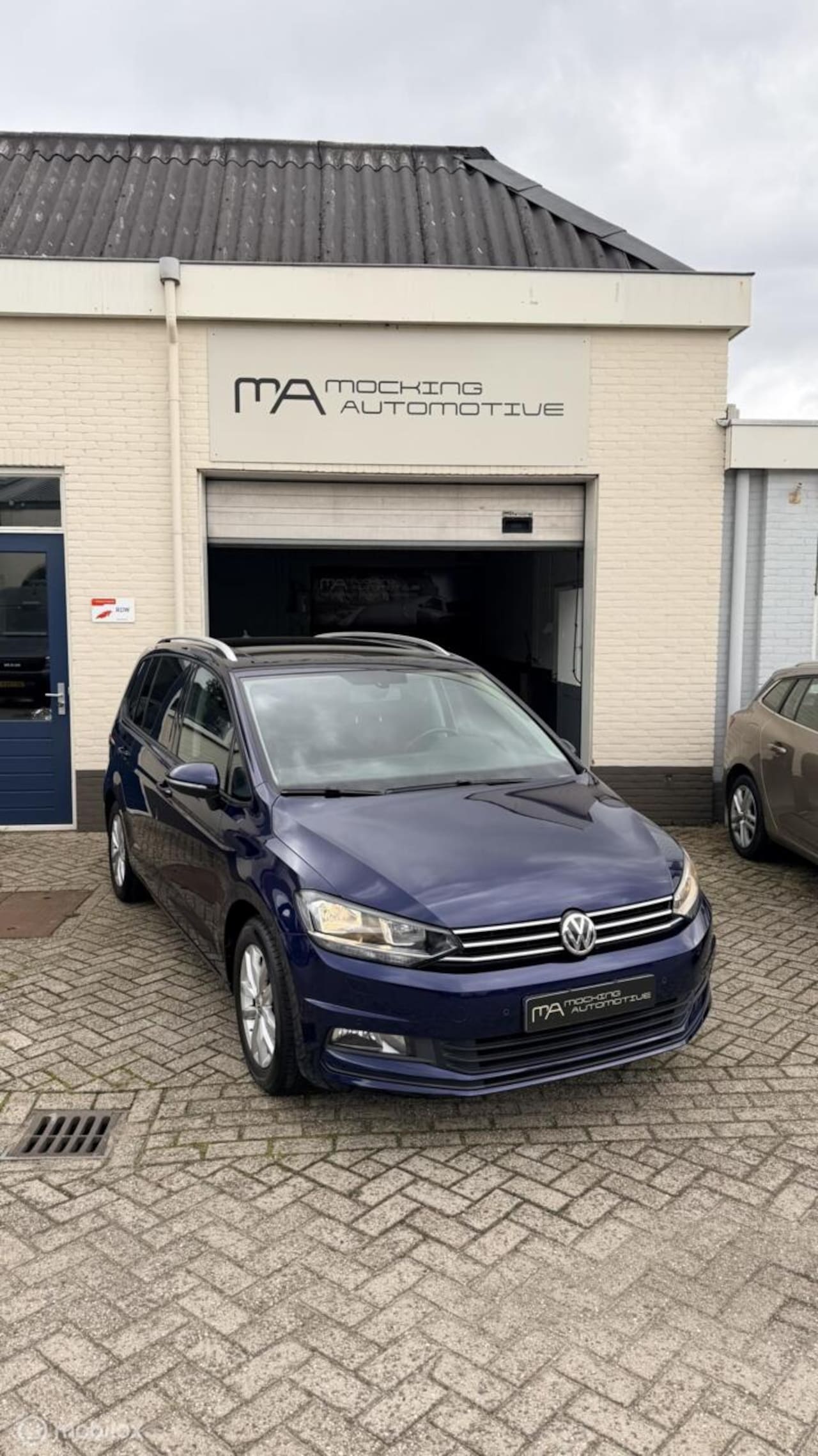 Volkswagen Touran - 1.2 TSI Highline 7p 1.2 TSI Highline 7P - AutoWereld.nl