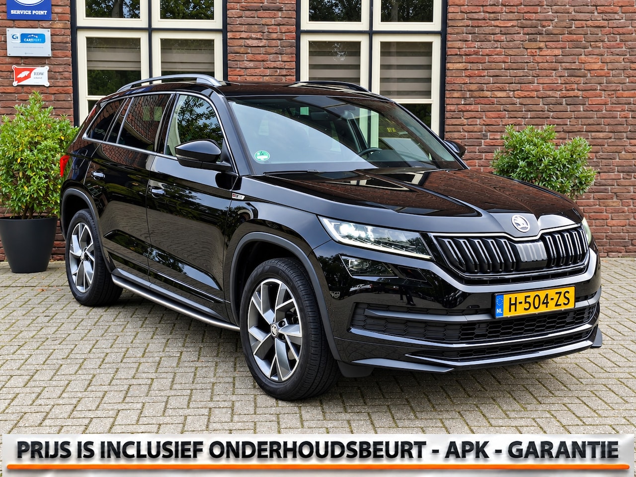 Skoda Kodiaq - 1.5 TSI DSG Aut. Sportline Panoramadak | Camera | Treeplanken - AutoWereld.nl