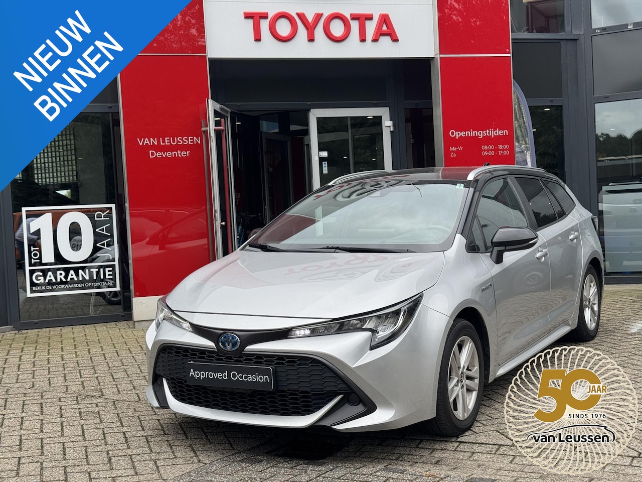 Toyota Corolla - 1.8 Hybrid Business TREKHAAK STUUR+STOELVERWARMING ELEKTR. ACHTERKLEP - AutoWereld.nl