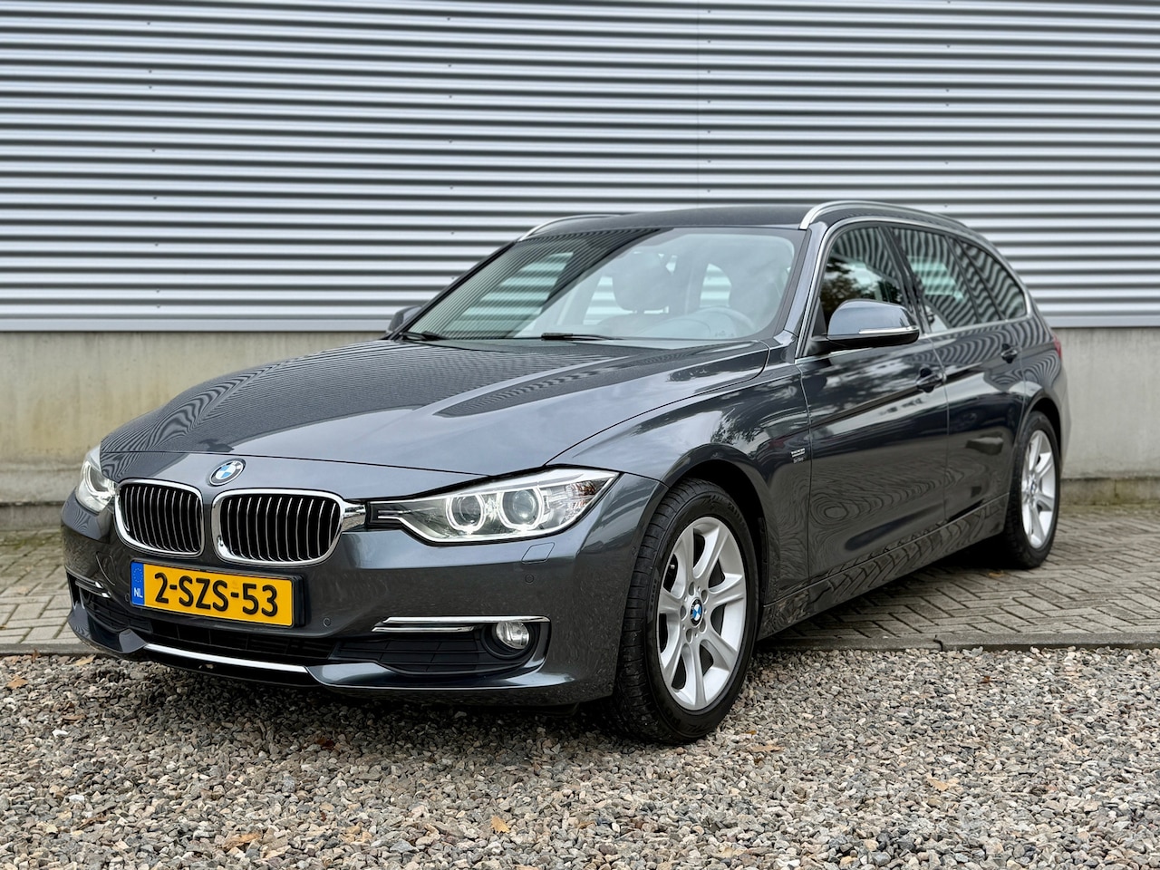 BMW 3-serie Touring - 136pk High Executive Automaat [ 1ste eig, dealer oh, zeer netjes ] - AutoWereld.nl