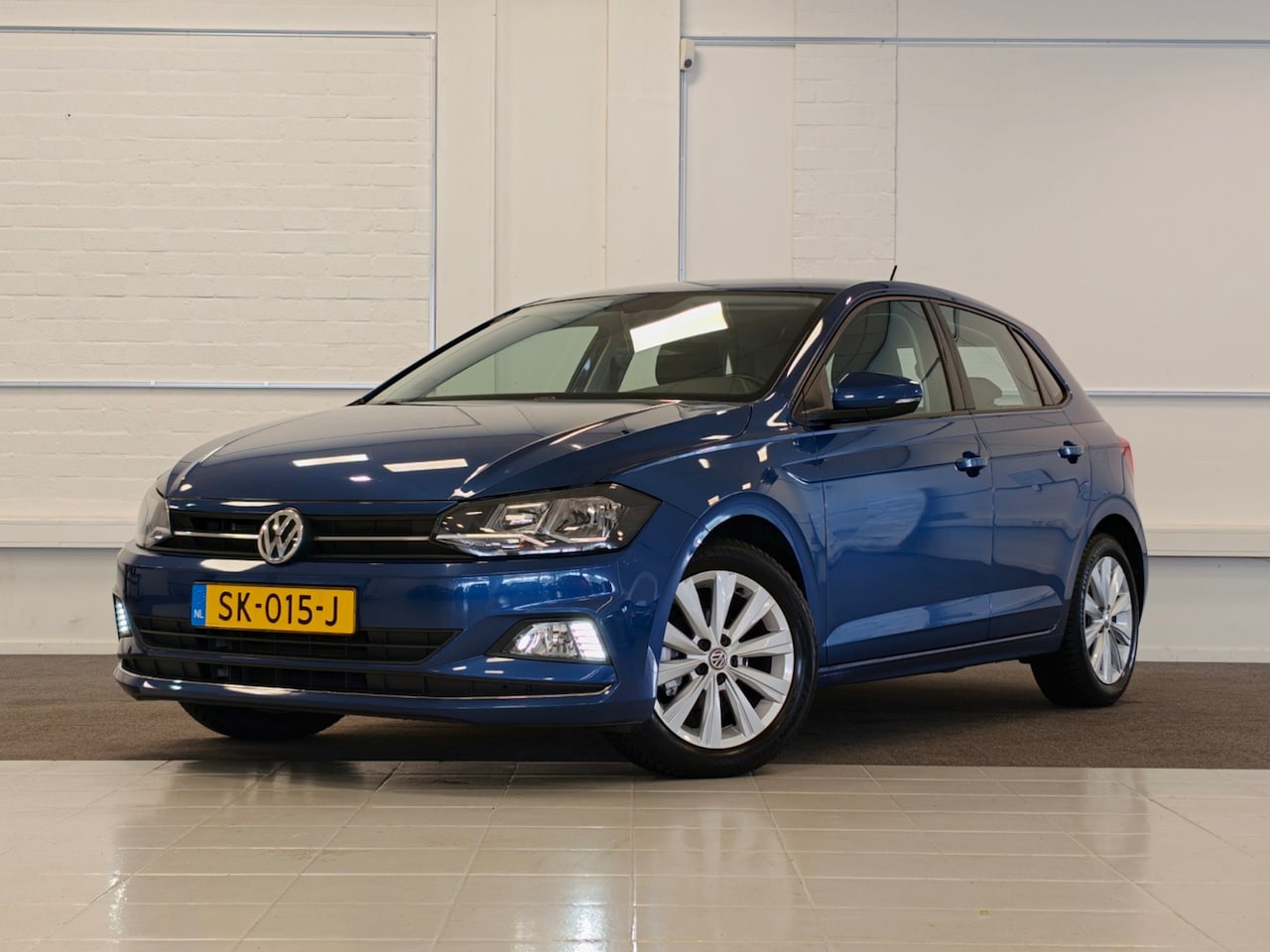 Volkswagen Polo - 1.0 TSI Highline DSG Allseason Clima Carplay Cruise adaptief - AutoWereld.nl