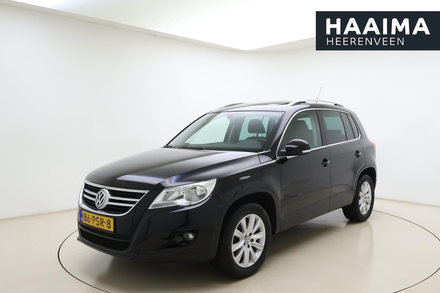 Volkswagen Tiguan - 1.4 TSI Sport&Style 4Motion | Navigatie | Apple Carplay/Android Auto | Trekhaak wegklapbaa - AutoWereld.nl