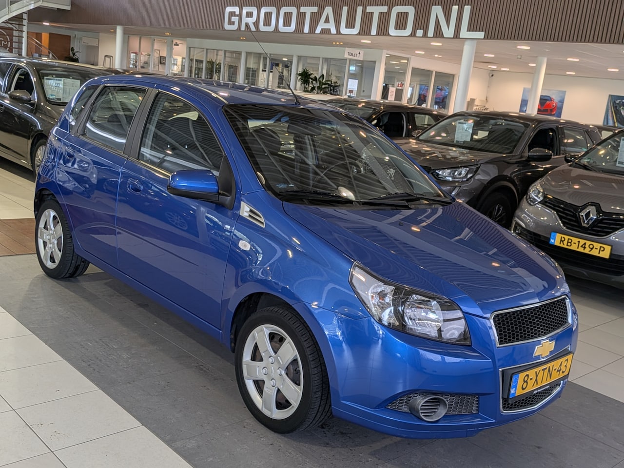 Chevrolet Aveo - 1.2 LT Airco, Stuurbekrachtiging - AutoWereld.nl