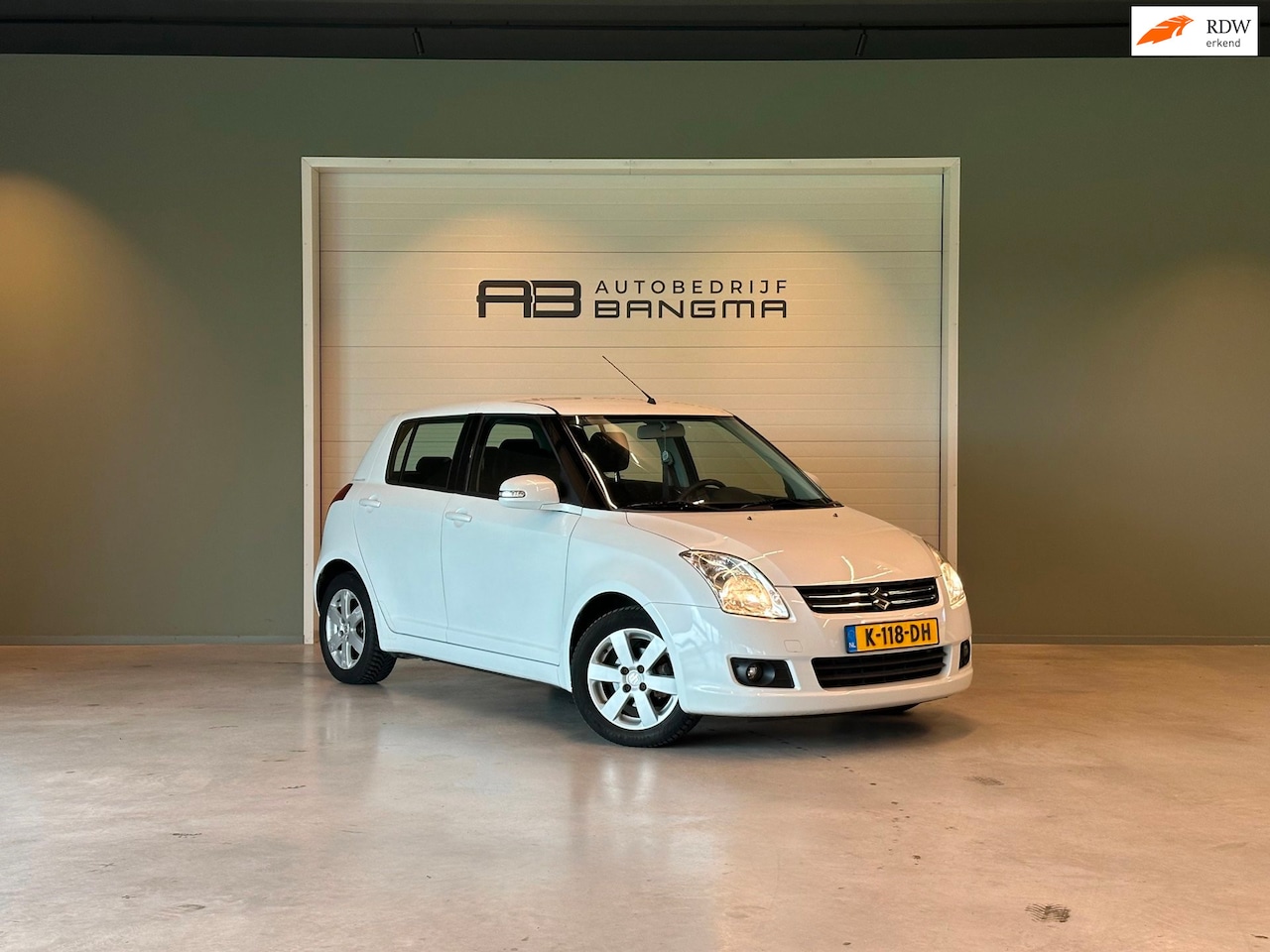 Suzuki Swift - 1.3i 16v 5-DEURS LIMITED 25-uitv|AIRCO|STOELVERWARMING|ZWARTE LM-VELGEN|NIEUWE APK + ONDER - AutoWereld.nl