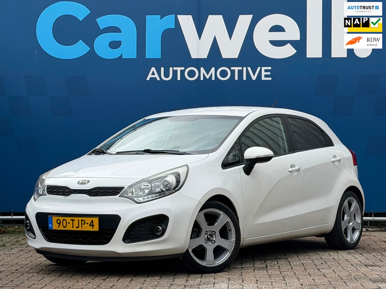 Kia Rio - 1.2 CVVT Super Pack|1e Eigenaar|AfnmTrekhaak|Carplay|Cruise|Climate|Camera|PDC|Keyless|LMV - AutoWereld.nl
