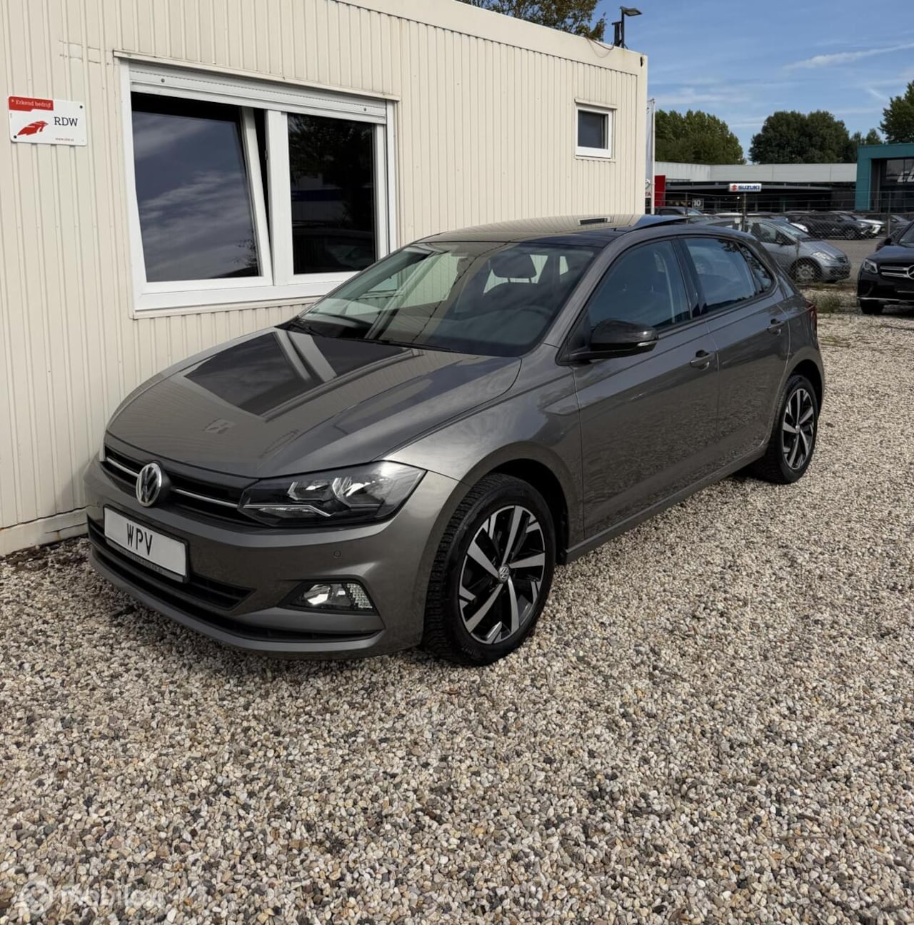 Volkswagen Polo - 1.0 TSI 95PK Highline Panoramadak Carplay - AutoWereld.nl