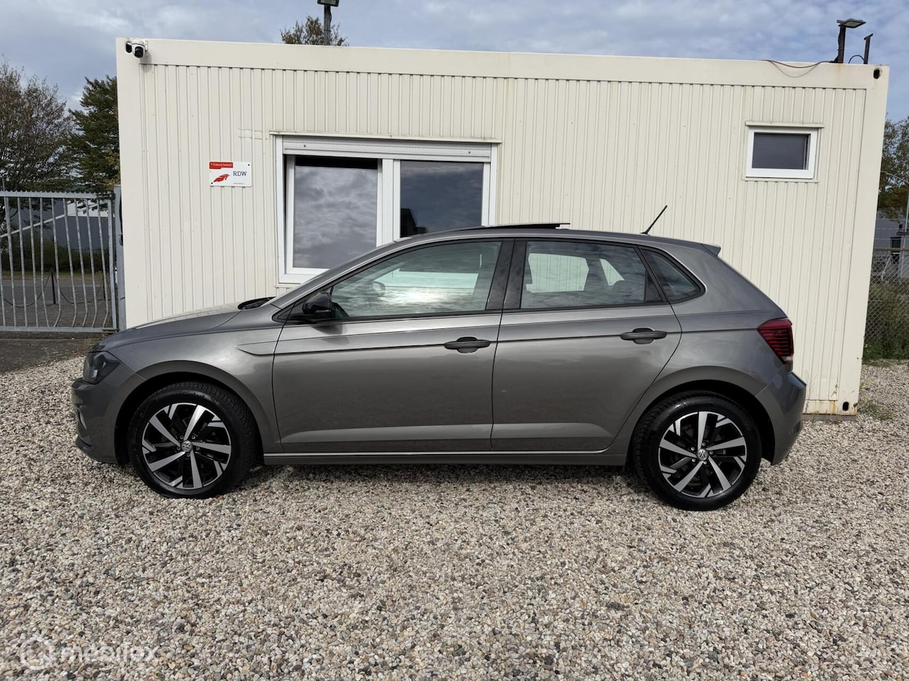 Volkswagen Polo - 1.0 TSI 95PK Highline Panoramadak Carplay - AutoWereld.nl