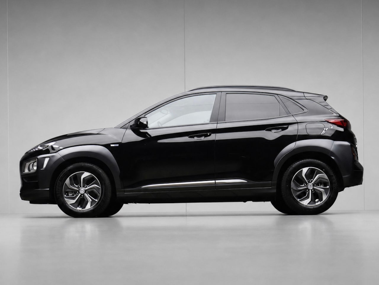 Hyundai Kona - 1.6 GDI HEV Fashion Sport (APPLE CARPLAY,HEAD-UP DISPLAY,NAVI,CAMERA,PDC,CRUISE,GETINT,LED - AutoWereld.nl