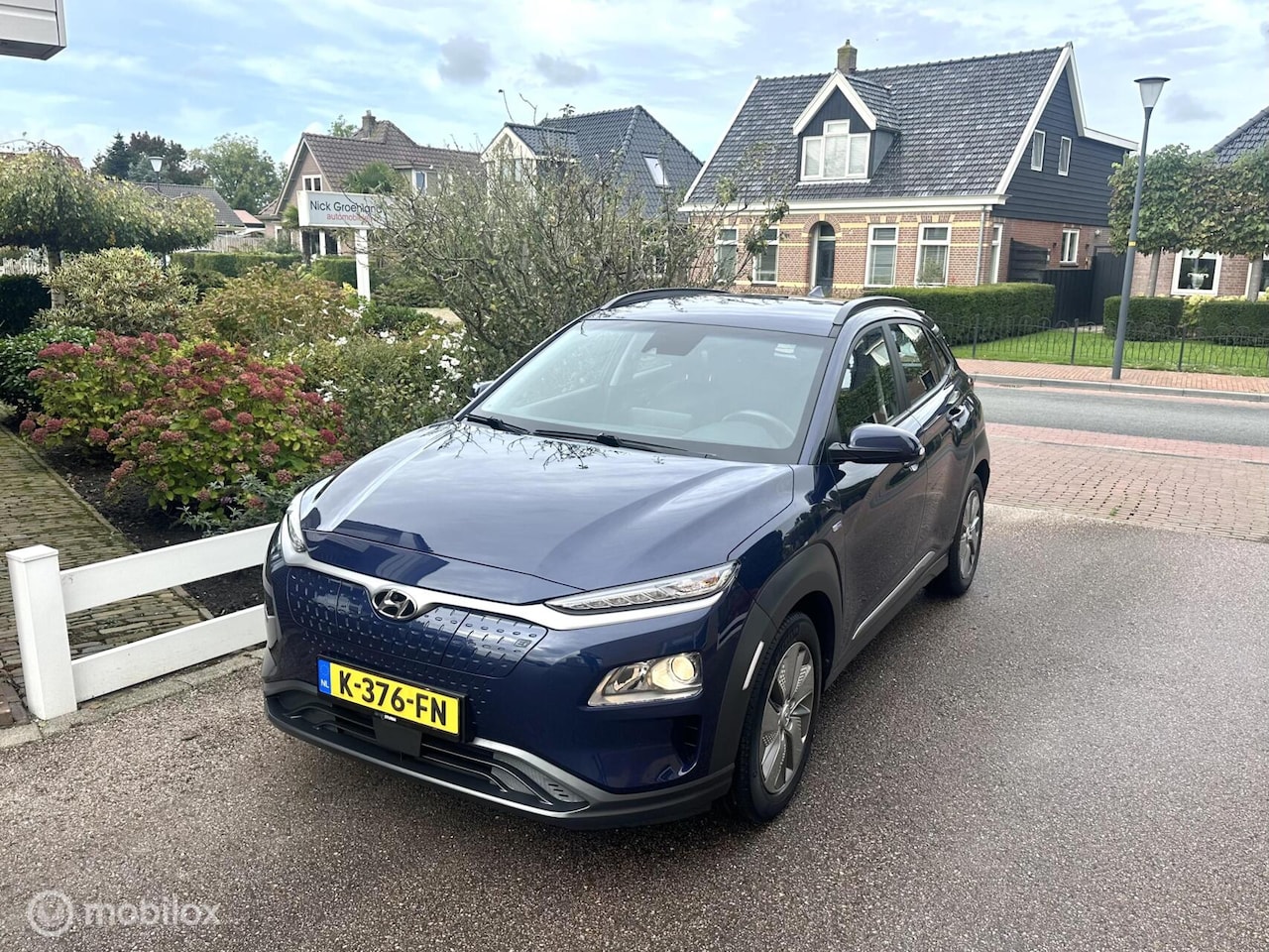 Hyundai Kona Electric - EV Comfort Smart 64 kWh 3-FASE SNELLADEN SOH 100% WARMTEPOMP CARPLAY ACHTERUITRIJ CAMERA N - AutoWereld.nl