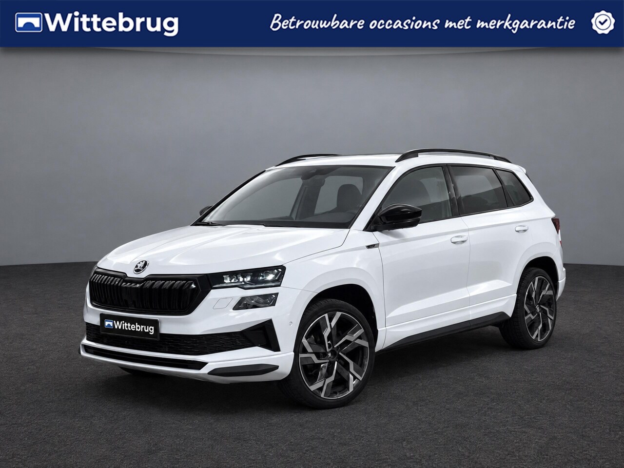 Skoda Karoq - 1.5 TSI 150pk ACT Sportline Business / Leder Verwarmbare stoelen vóór en achter / Virtual - AutoWereld.nl