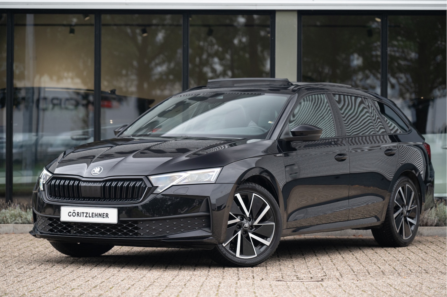 Skoda Octavia Combi - 1.5 TSI MHEV Sportline Business | Pano | Trekhaak | ACC | Navi | Dodehoekdet. | Matrix LED - AutoWereld.nl