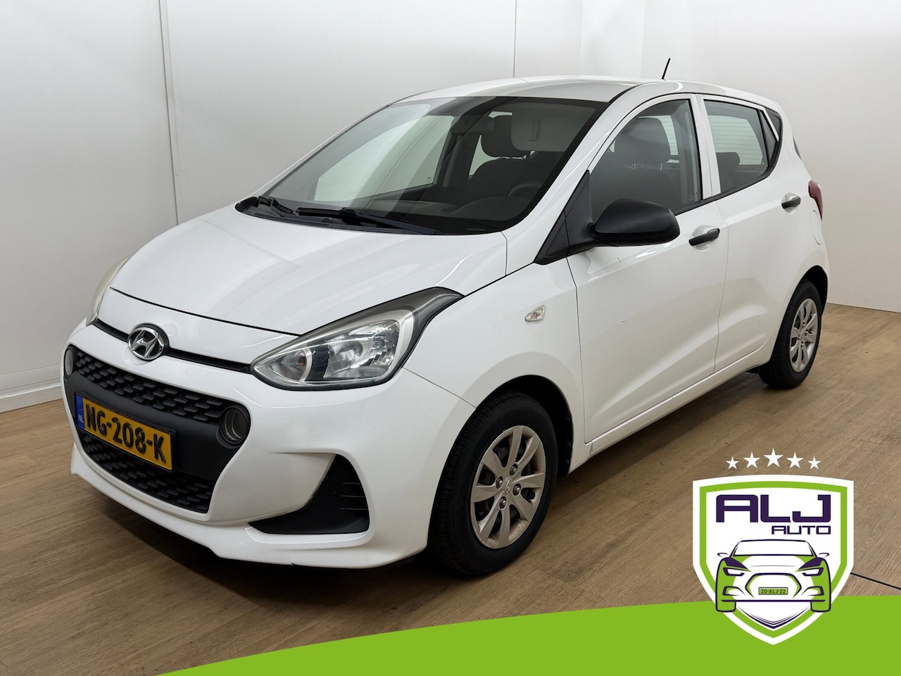 Hyundai i10 - Occasion 1.0i i-Motion | Wit | Tweedehands Hyundai I10 | Airco | Usb audio - AutoWereld.nl