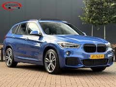 BMW X1 - sDrive20i Centennial High Executive / M-Sport / Estoril Blauw /