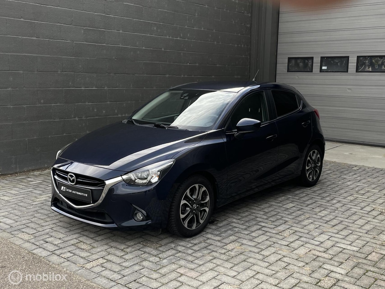 Mazda 2 - 1.5 Skyactiv-G Sport-Line | AIRCO | Navi | PDC | LED | Cruise | All-season | - AutoWereld.nl