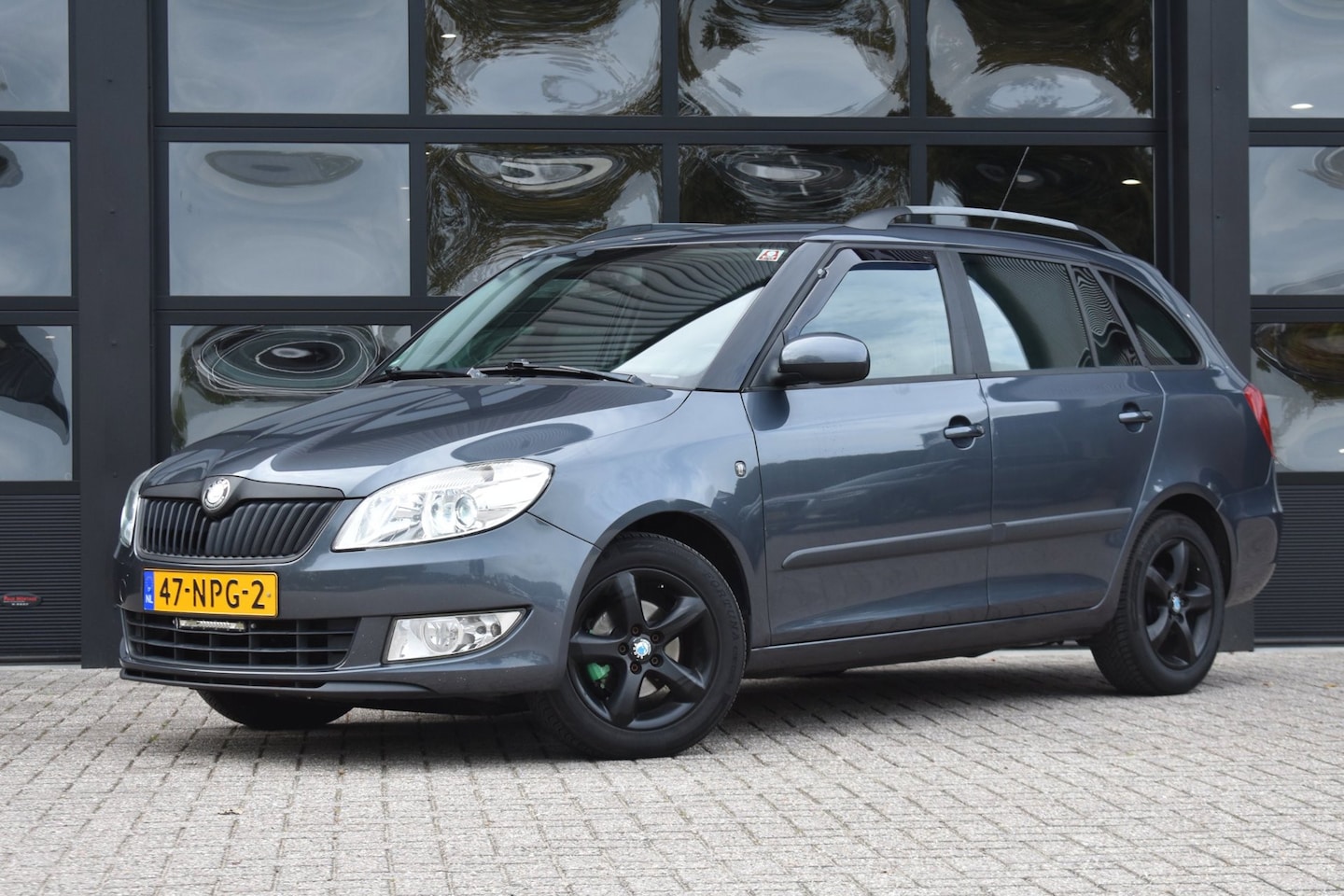 Skoda Fabia Combi - 1.2 TDI Greenline '10 Navi Clima Cruise - AutoWereld.nl