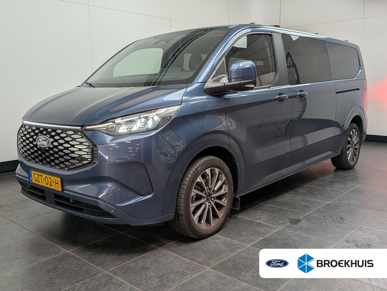 Ford Transit Custom Tourneo - 340 L2H1 Titanium X 65 kWh | Elek. Schuifdeuren | Trekhaak | AGR Stoel | Camera | Apple Ca - AutoWereld.nl