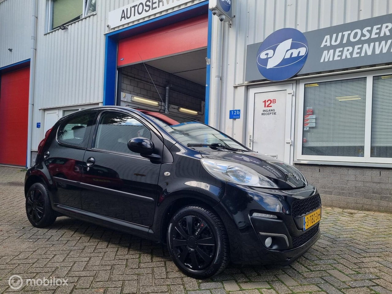 Peugeot 107 - 1.0 Active|airco|elektr ramen|parkeer sensoren achter - AutoWereld.nl