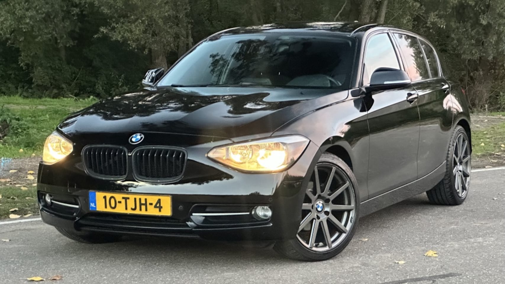 BMW 1-serie - 116i Business+|Clima|Navi|Pdc|Cruise - AutoWereld.nl