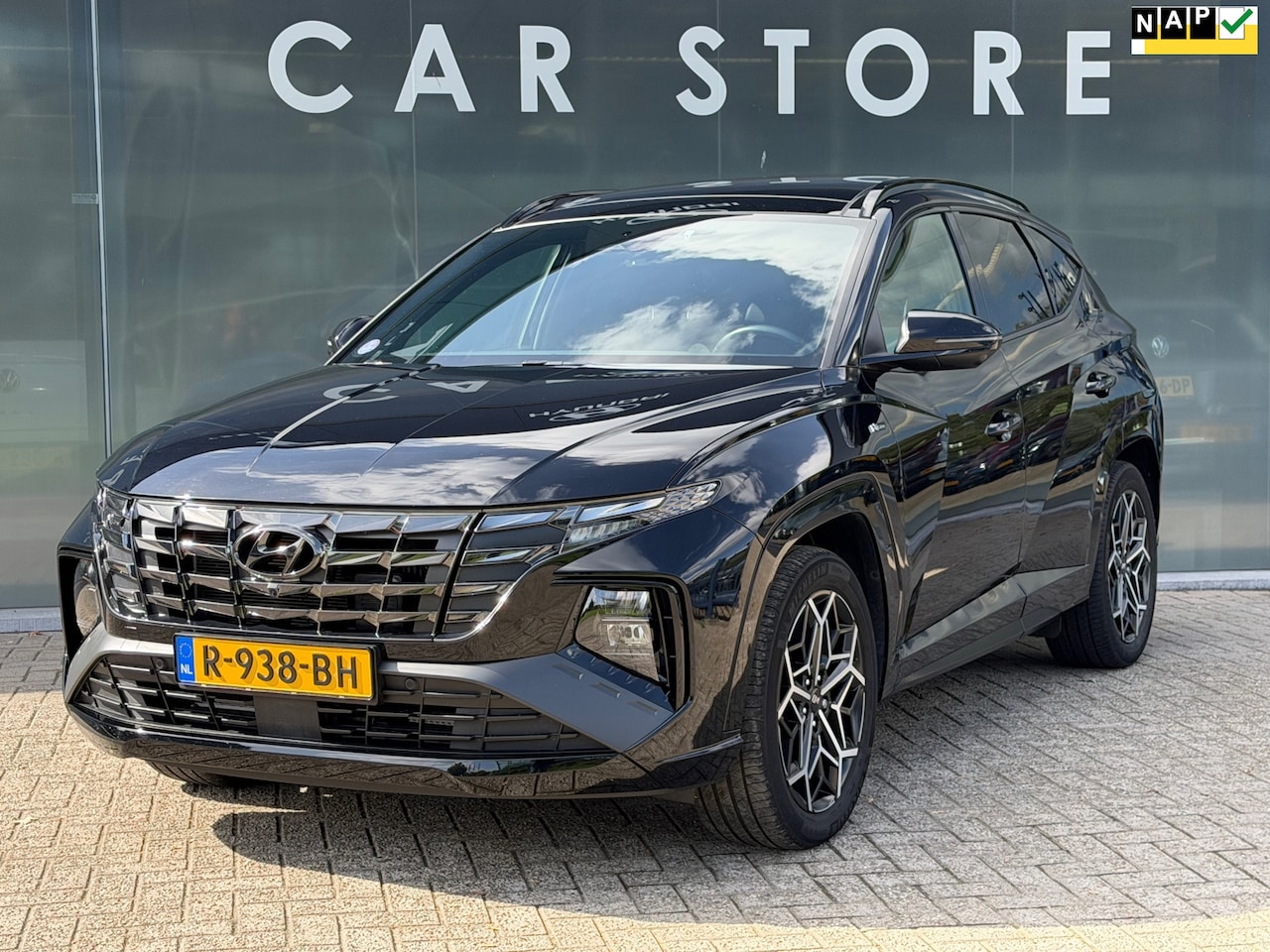 Hyundai Tucson - 1.6 T-GDI PHEV N Line Sky 4WD SOH 100%PANO/TREKHAAK/NL AUTO - AutoWereld.nl