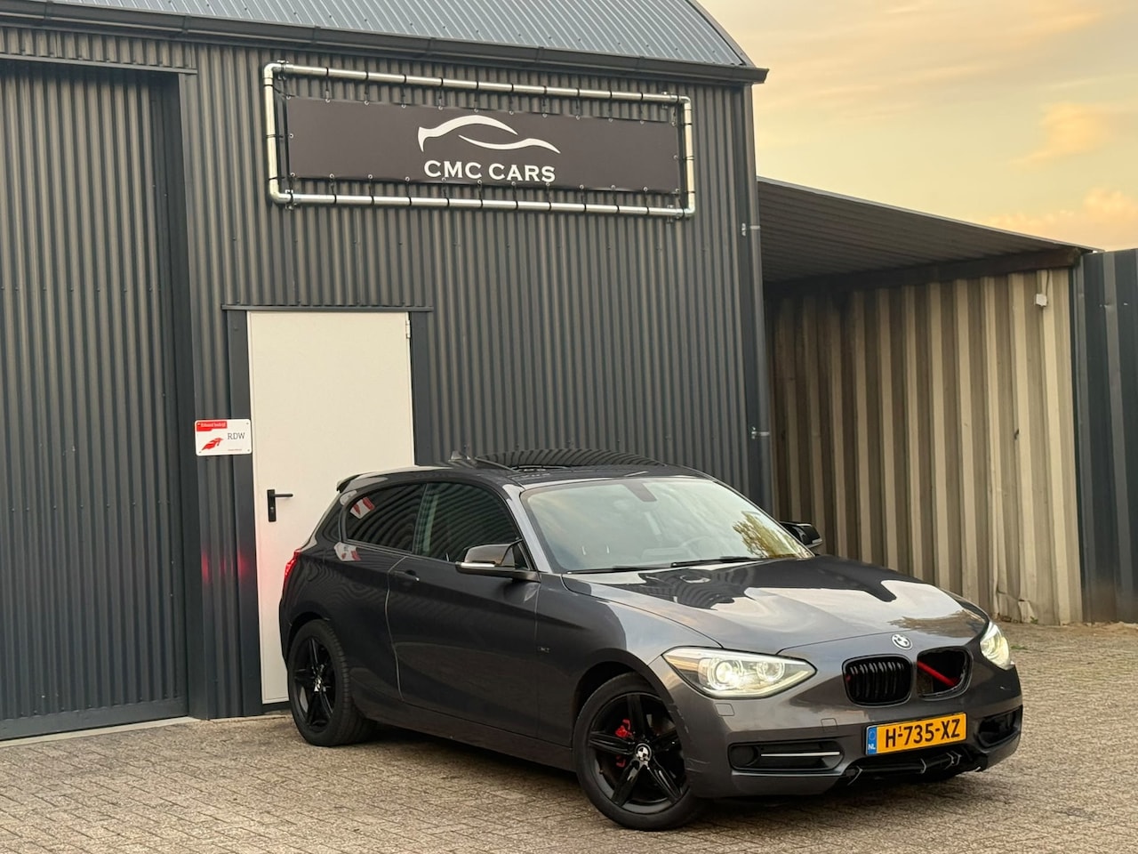 BMW 1-serie - 116d Business+ AUTOMAAT!!DAK!!LEER!!XENON!! - AutoWereld.nl