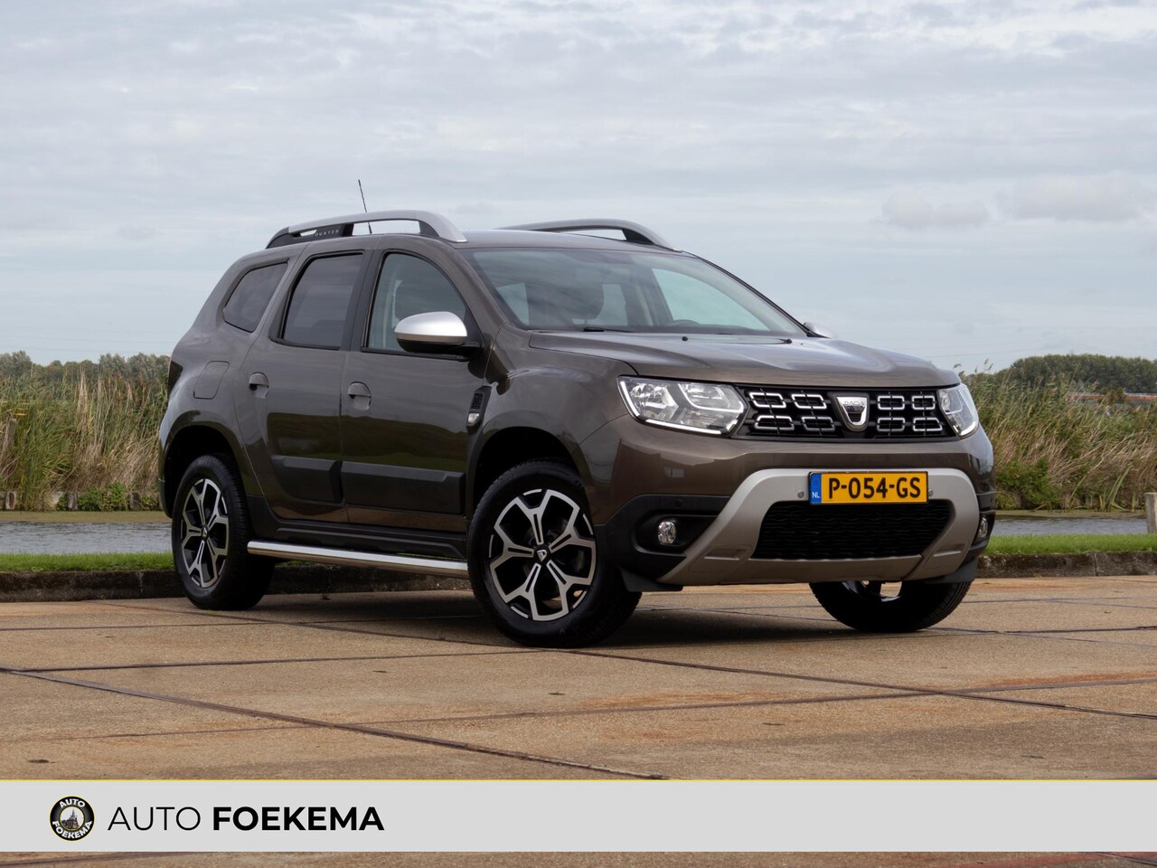 Dacia Duster - 1.0 TCe Bi-Fuel Comfort Camera Sidebars Navi - AutoWereld.nl