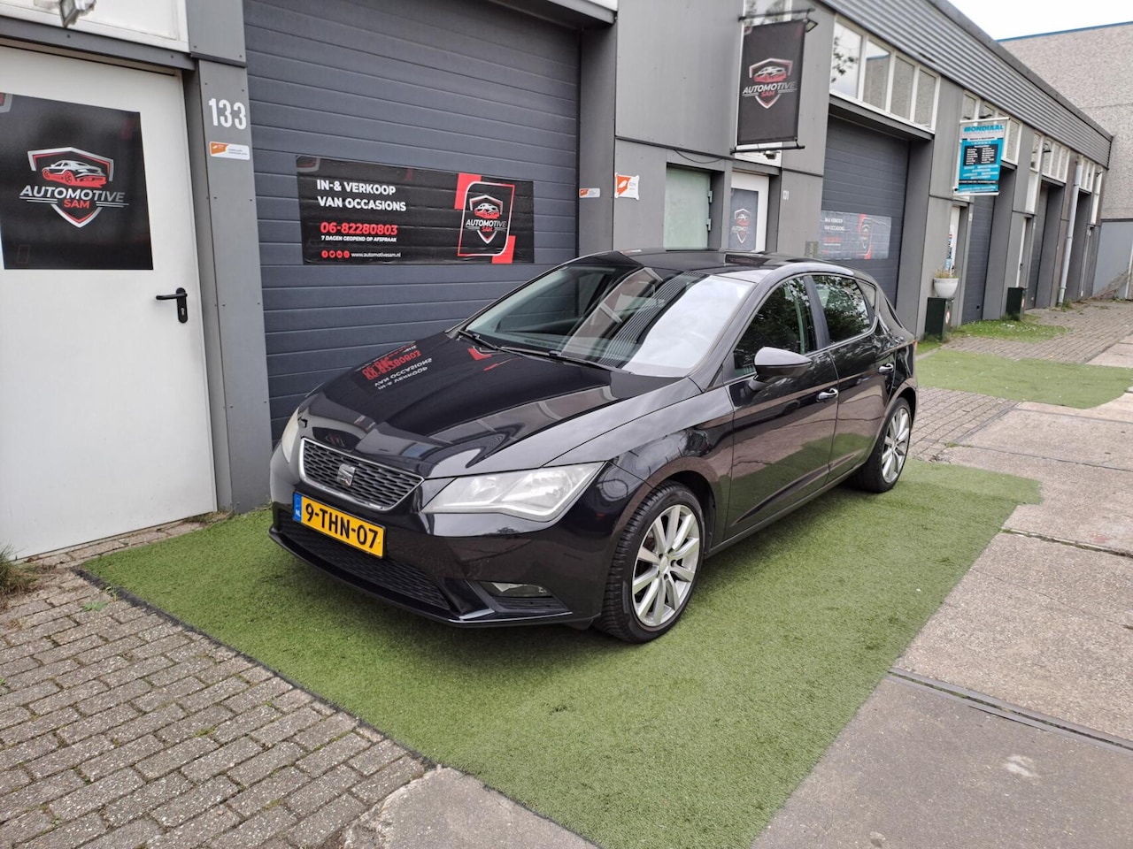 SEAT Leon - 1.2 TSI Style 2013 Zwart Clima Cruise Carplay - AutoWereld.nl